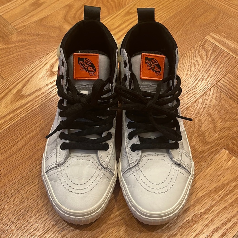 Vans “NASA” high top sneaker, women’s size 8. Great condition, barely worn.